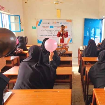 Conducting community awareness sessions for women and girls